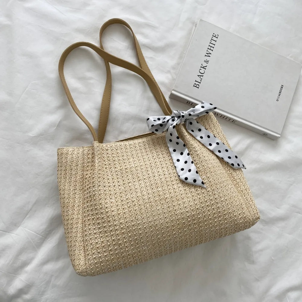 SOLINE – Geflochtene Sommertasche mit Lederelementen & Schleifenakzent
