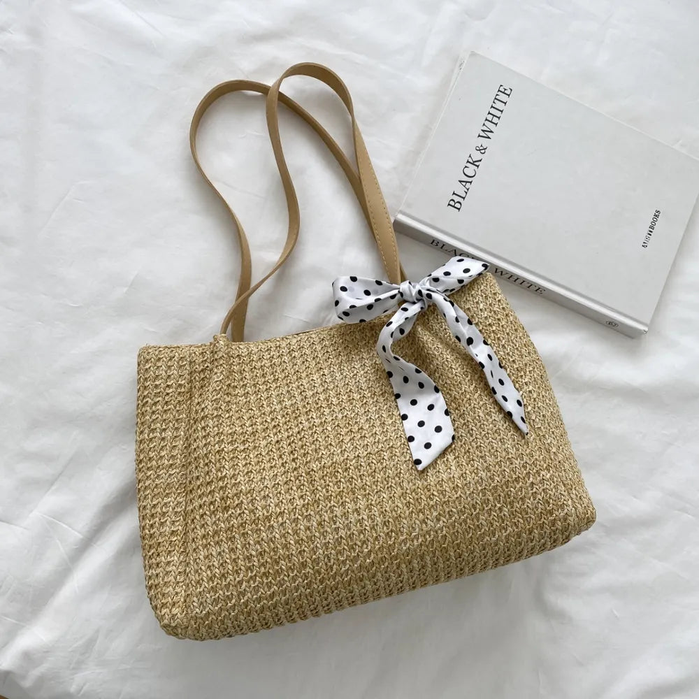 SOLINE – Geflochtene Sommertasche mit Lederelementen & Schleifenakzent