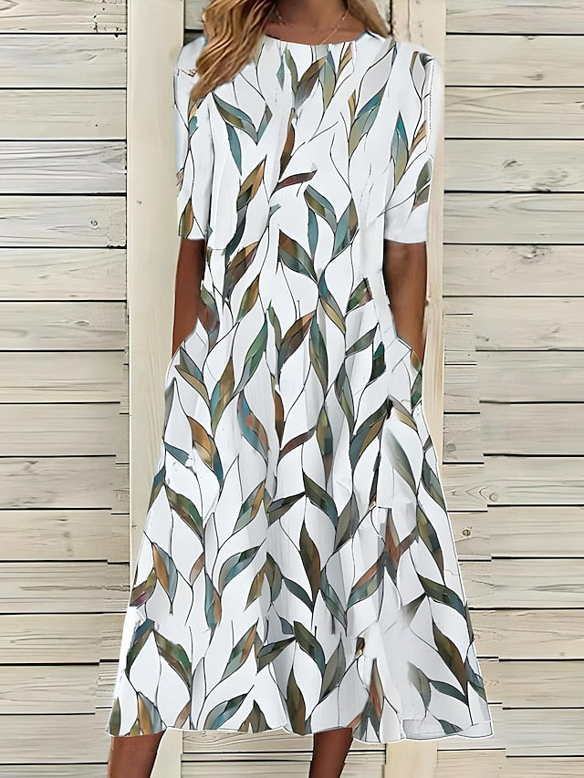 Sela – Sommerliches Midi-Kleid mit Rundhalsausschnitt und Küstenblumenmuster
